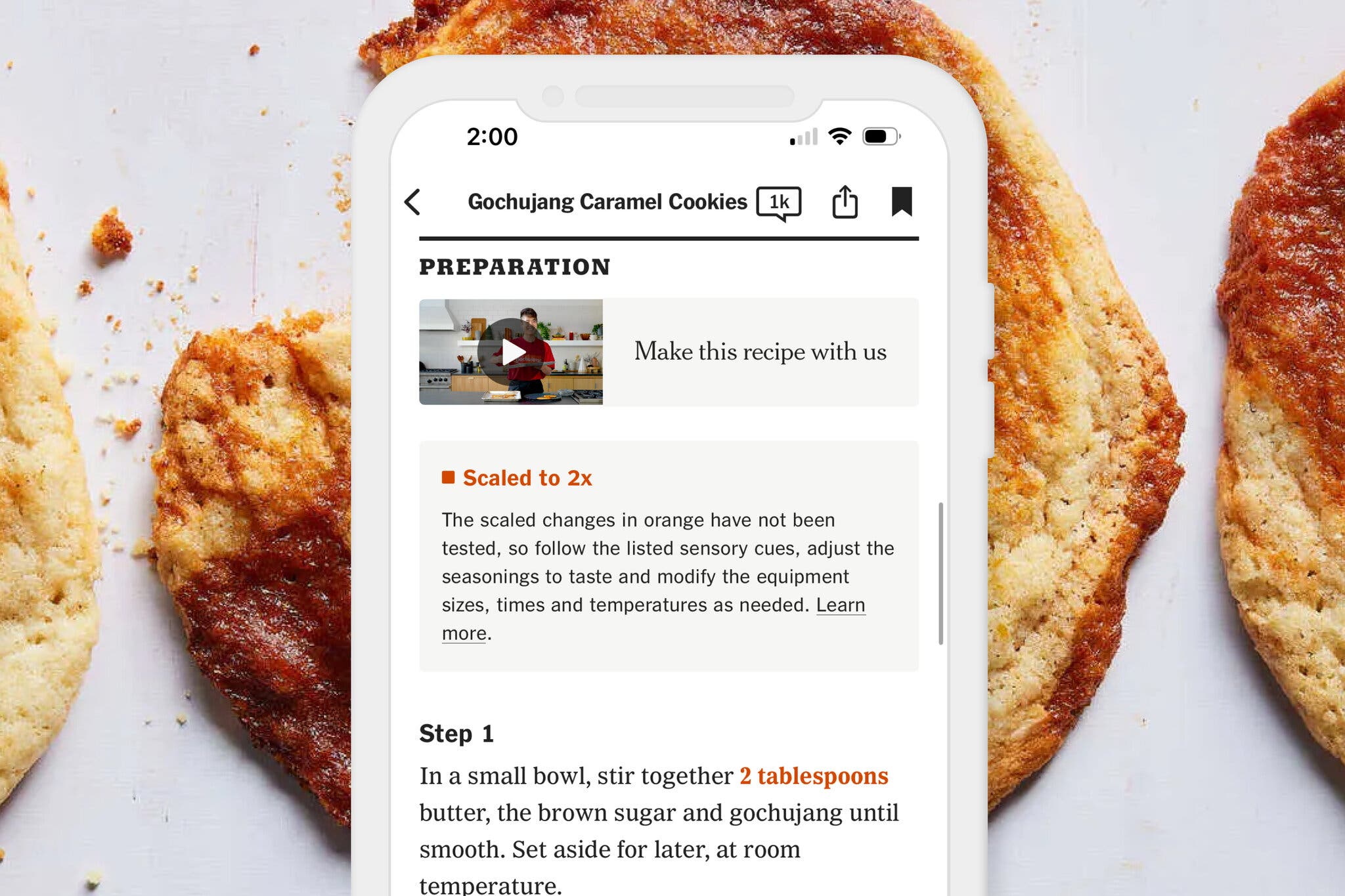 A screenshot of a scaled recipe against a backdrop of cookies.